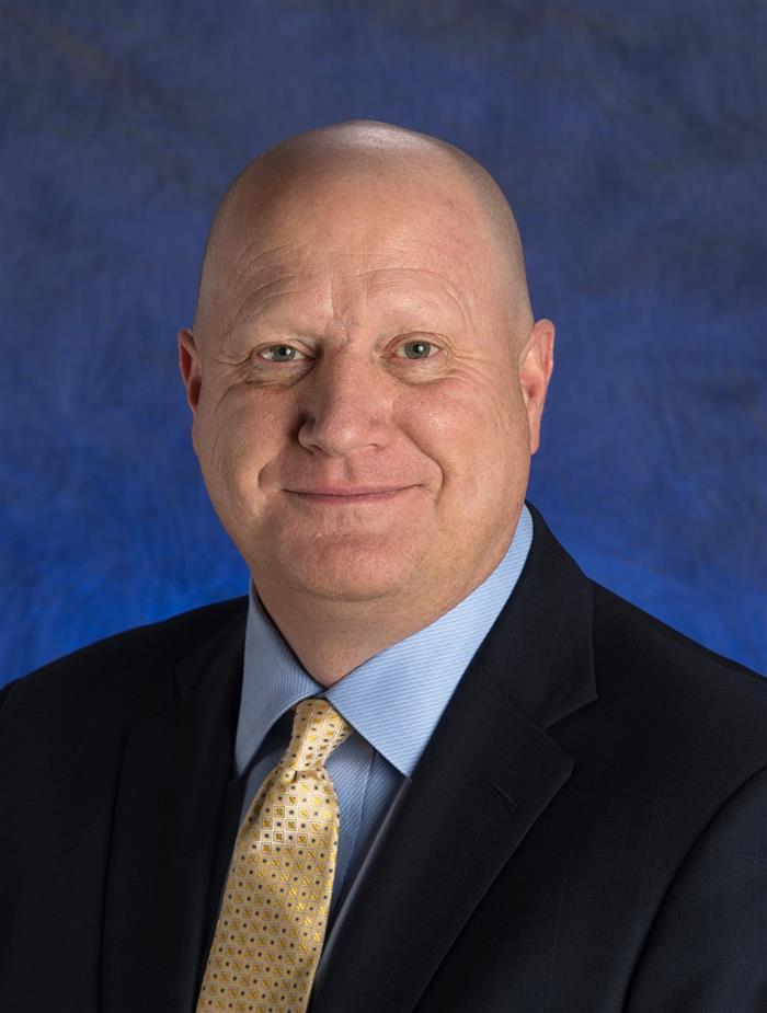 Mr. Trevor F. Lauer