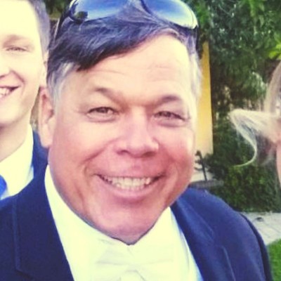 Mr. Mark R. Newcomer