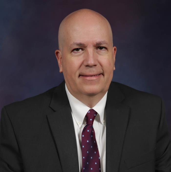 Mr. Michael E. Tarvin