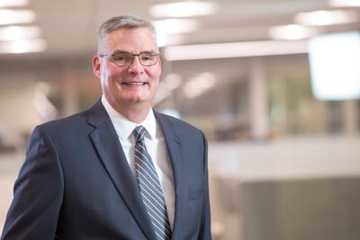 Mr. James E. DeVries