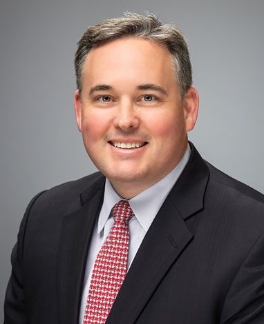 Mr. Eric M. Hambly