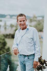 Mr. Robert W. Duggan