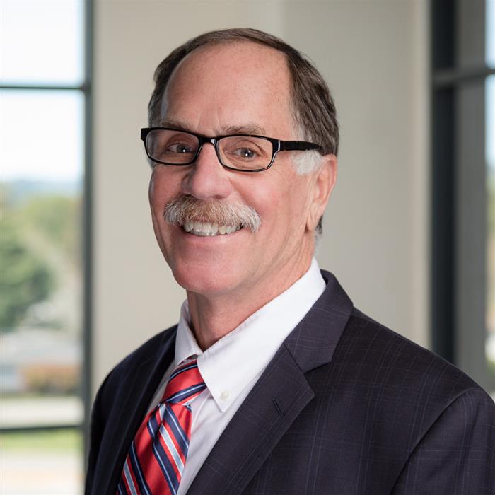 Mr. Alan J. Hennessy