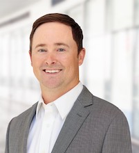 Mr. Lance D. Brown