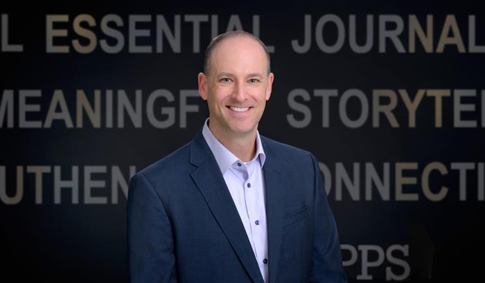 Mr. Adam P. Symson