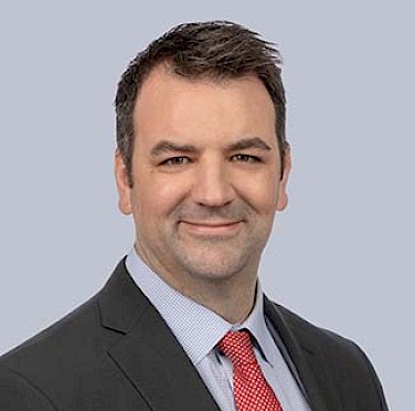 Mr. Daniel W. Dickson B.Com.