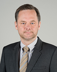 Mr. Mark R. Young